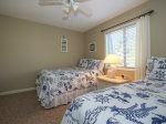 Upstairs Guest Room with Two Double Beds at 21 Hilton Head Cabanas